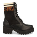 Botines Elegantes Negro con Detalles Distintivos