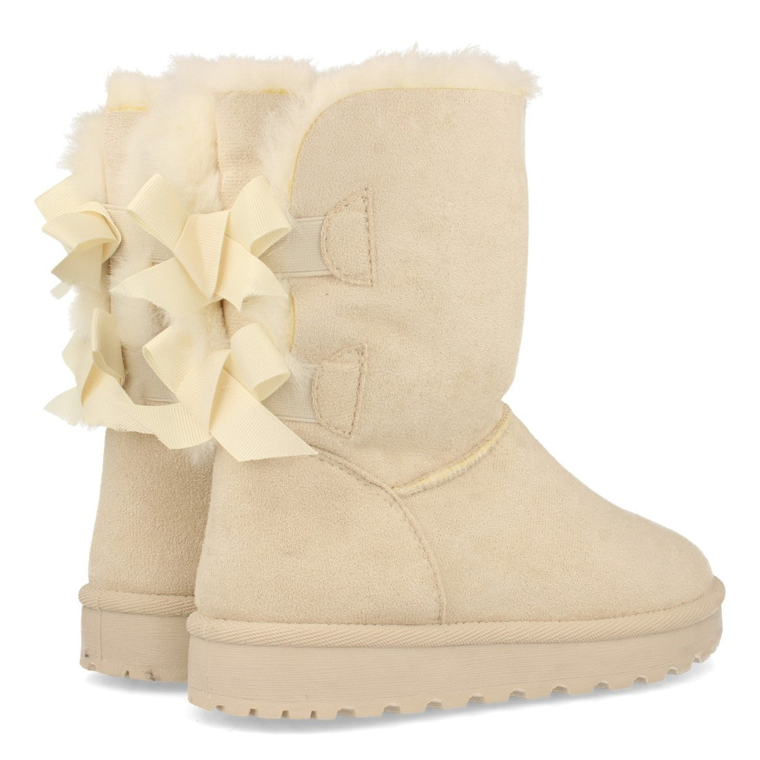 Botines Elegantes Beige con Detalles Distintivos